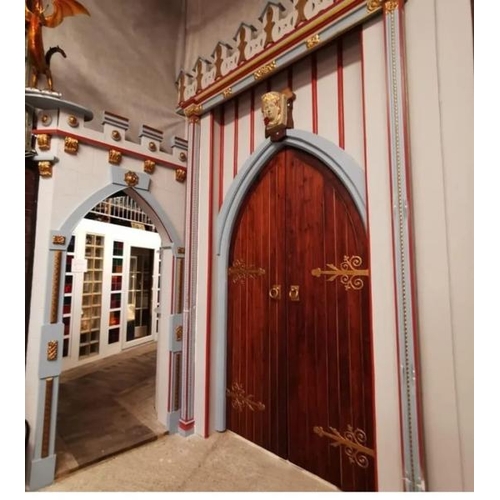 779 - A pair of ornate pitch pine church entry doors with original frame and hinges, included is the faux ... 