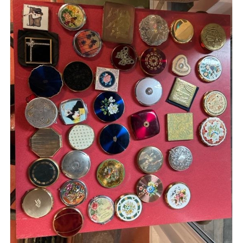 78 - A collection of thirty-eight assorted compacts, various styles  / All lots are located at Gower Recl... 