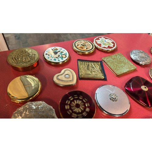 78 - A collection of thirty-eight assorted compacts, various styles  / All lots are located at Gower Recl... 