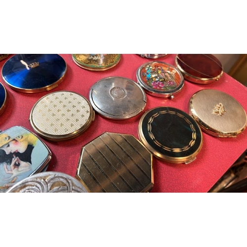 78 - A collection of thirty-eight assorted compacts, various styles  / All lots are located at Gower Recl... 