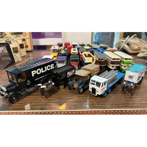 80 - A collection of thirty-two unboxed Matchbox, Lledo, Days Gone By and Corgi model vehicles  / All lot... 