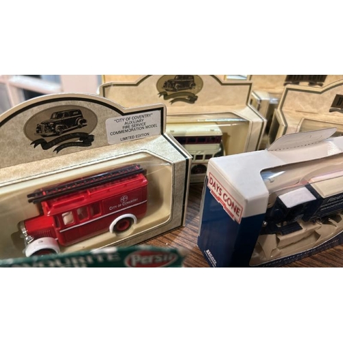 81 - A collection of twenty-one boxed Lledo and Days Gone By model vehicles  / All lots are located at Go... 