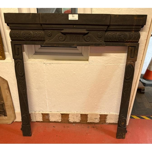 85 - A cast iron fireplace surround, external dimensions 109cm (h) x 100cm (w)  / All lots are located at... 