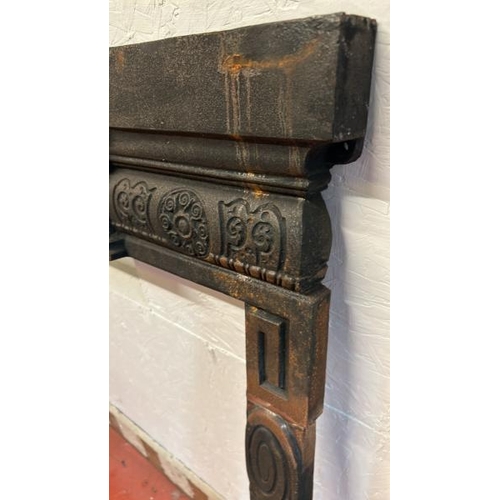 85 - A cast iron fireplace surround, external dimensions 109cm (h) x 100cm (w)  / All lots are located at... 