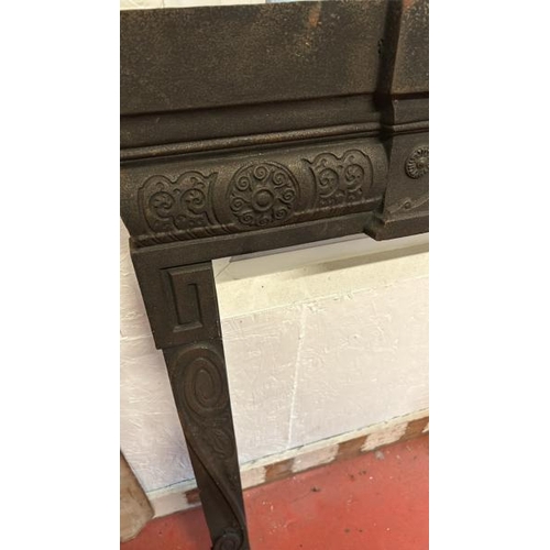 85 - A cast iron fireplace surround, external dimensions 109cm (h) x 100cm (w)  / All lots are located at... 