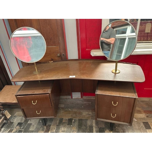 99 - A G-Plan four drawer dressing table with two circular mirrors above, measurements (excluding mirrors... 