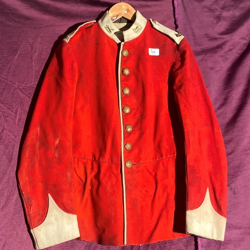 724 - 19th-century British military red tunic, featuring brass buttons and white cuffs   / All lots are lo... 