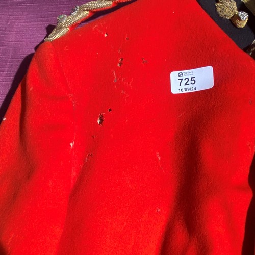 725 - British military red tunic from the early 20th century with three attached medals. It comes with det... 