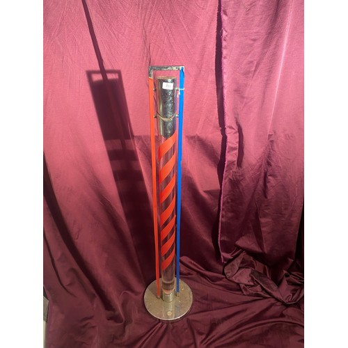 733 - Vintage barbershop pole with red and blue spiral stripes encased in a transparent cylinder. It has a... 