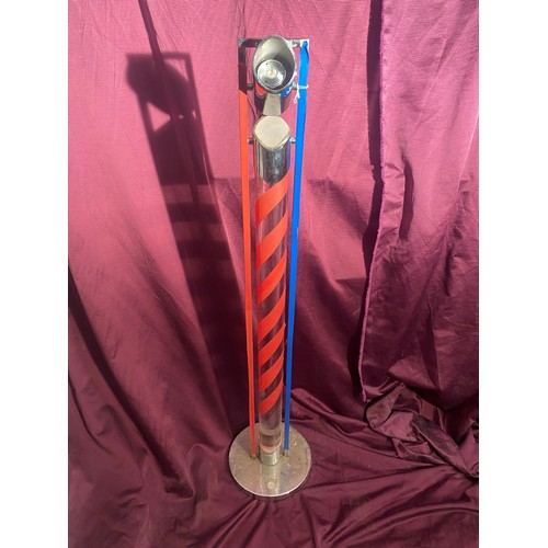 733 - Vintage barbershop pole with red and blue spiral stripes encased in a transparent cylinder. It has a... 