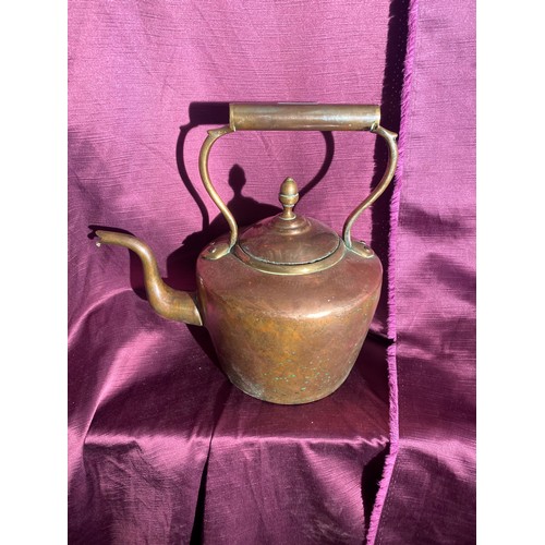 736 - Antique copper kettle with a wooden handle. It features an elegant swan-neck spout and a hinged lid ... 