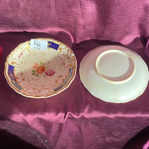 750 - Pair of vintage porcelain bowls featuring ornate blue and gold floral and gilt designs.   / All lots... 