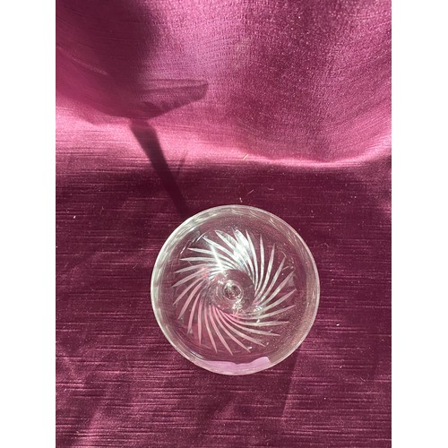 754 - Vintage etched glass champagne coupe featuring an elegant swirl pattern.   / All lots are located at... 