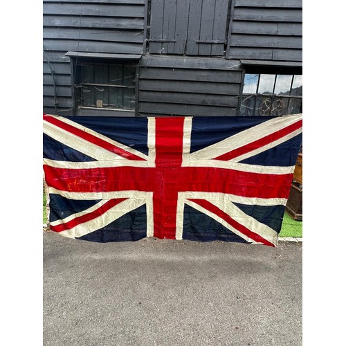 814 - A large vintage British Union Jack flag, minor flaws and a few holes, 140cm (h) x 269cm (w)  / All l... 