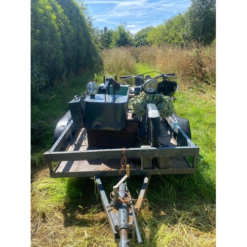 911 - A movie prop motorbike and sidecar, created to replicate a German motorcycle, complete with trailer,... 