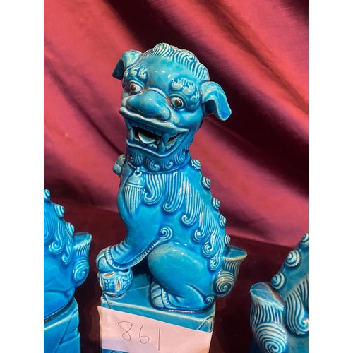 861 - Set of three early 20th century turquoise ceramic Foo Dog statues with glaze finish. Traditional gua... 