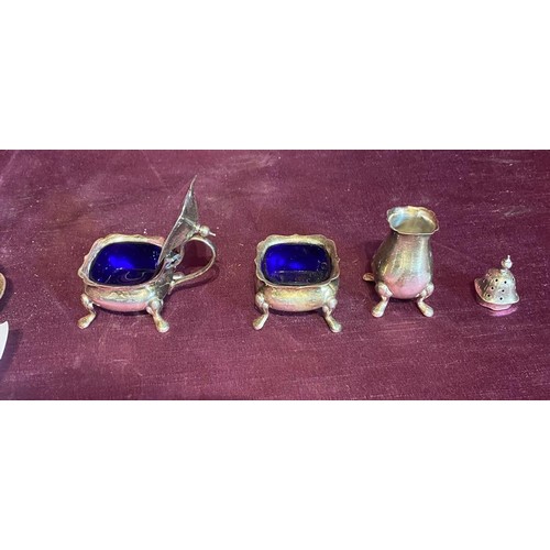 862 - Silver EPNS condiment set with blue glass liners, comprises salt, pepper, mustard pot, and tray.   /... 