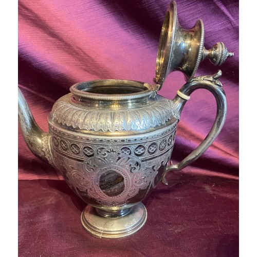 863 - Set of four antique EPNS silver tea service pieces, including intricately engraved teapot, sugar bow... 