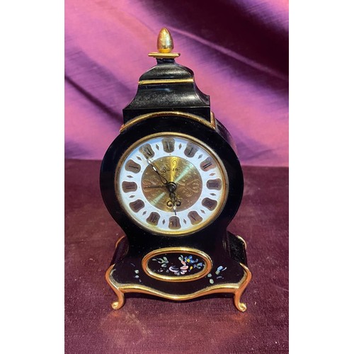 867 - Mid 20th century black enamel mantel clock with floral accents, Roman numeral dial, and gold trim de... 