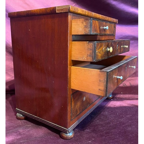 473 - A fine quality 19th century apprentice chest, a miniature set of two over three graduated drawers wi... 