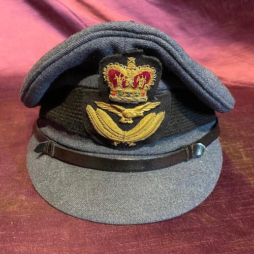 676 - A mid-20th century RAF officers peaked hat / All lots are located at The Barn, Hampstead Farm, Nr He... 