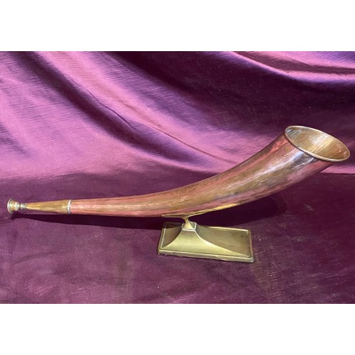 727 - A 20th century presentation huntsman's horn, copper on brass stand / All lots are located at The Bar... 