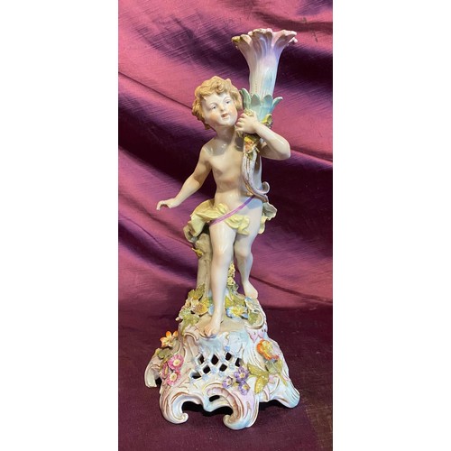 807 - A 19th century porcelain figure of a cherub, to a fine quality, continental hand painted, with damag... 