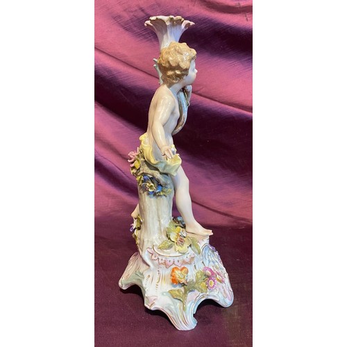 807 - A 19th century porcelain figure of a cherub, to a fine quality, continental hand painted, with damag... 