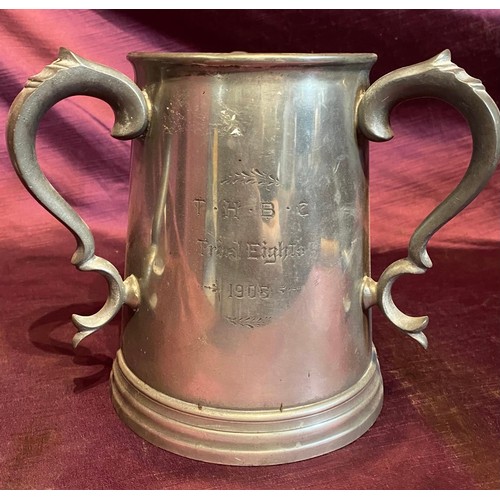 684 - A 19th century tri-handled presentation rowing tankard, in pewter / All lots are located at The Barn... 