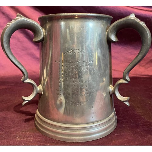 684 - A 19th century tri-handled presentation rowing tankard, in pewter / All lots are located at The Barn... 