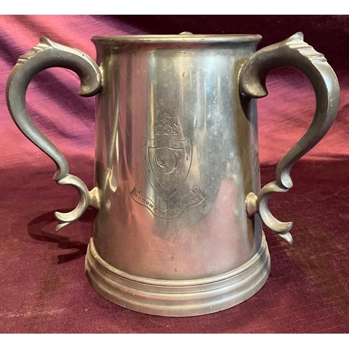 684 - A 19th century tri-handled presentation rowing tankard, in pewter / All lots are located at The Barn... 