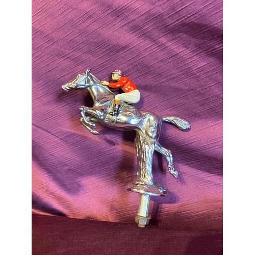 917 - Early 20th century car mascot in the form of a leaping hurdle jockey on horseback, bronze hand paint... 