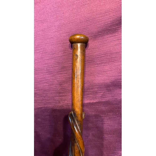 923 - A copper warming pan, however has been adapted with a very finely carved rope twist walking stick / ... 