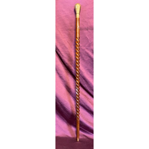 925 - A 20th century brass pummelled walking stick wit finely carved and twisted neck  / All lots are loca... 