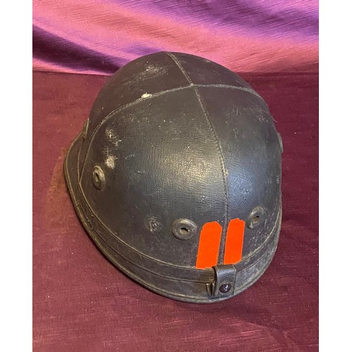 855 - Vintage black leather helmet with a strap, showcasing dual vertical yellow and red lines on the fron... 