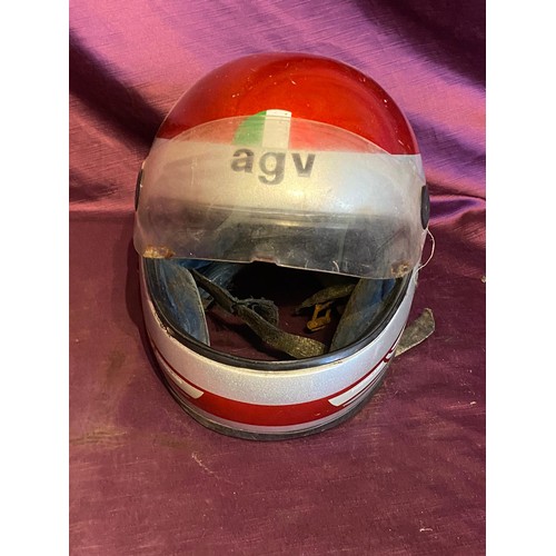 856 - Vintage AGV motorcycle helmet, red with Italian flag decal. It has a clear visor and rear motorcycle... 