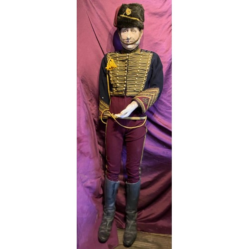 720 - A mid-20th century life sized mannequin of a gentleman dressed as a Hussar, vendor states that costu... 