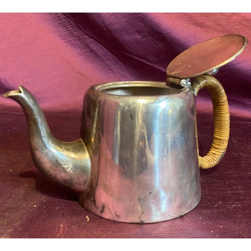 866 - (Property of the Schlaefli Estate), a silver plated teapot which Robin Schlaefli carried on active s... 