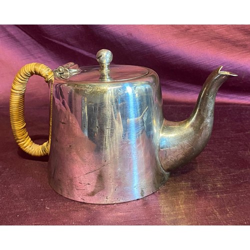 866 - (Property of the Schlaefli Estate), a silver plated teapot which Robin Schlaefli carried on active s... 