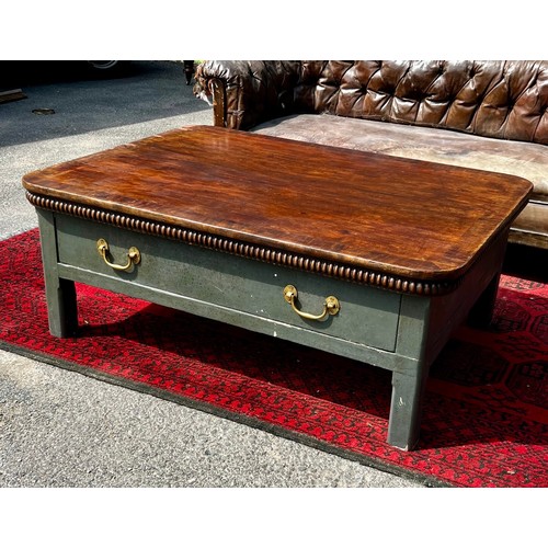 512 - A flame mahogany topped coffee table, created from reclaimed elements with painted pine four legged ... 