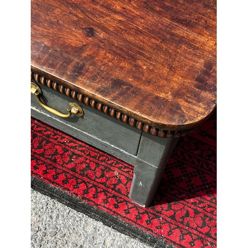 512 - A flame mahogany topped coffee table, created from reclaimed elements with painted pine four legged ... 