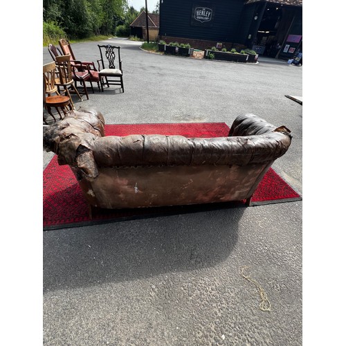 511 - Early 19th century horse-hair filled tanned leather solid buttoned Chesterfield sofa, in work condit... 