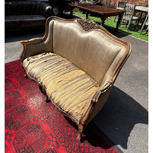 515 - A 20th century continental two seater salon sofa, with original silk upholstery, seat requires recov... 