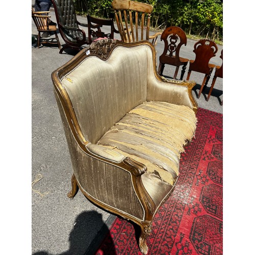 515 - A 20th century continental two seater salon sofa, with original silk upholstery, seat requires recov... 