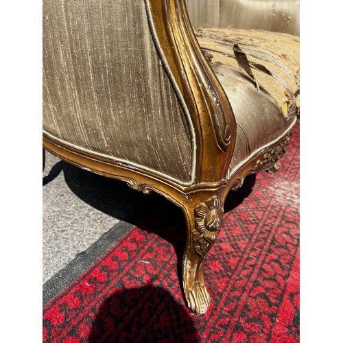 515 - A 20th century continental two seater salon sofa, with original silk upholstery, seat requires recov... 