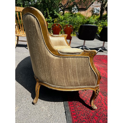 515 - A 20th century continental two seater salon sofa, with original silk upholstery, seat requires recov... 