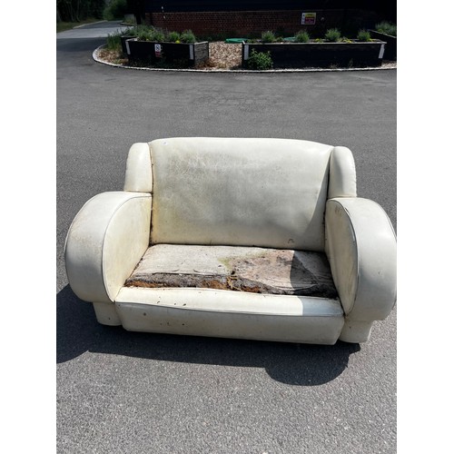 519 - Original art deco three seater sofa and two chairs, in leatherette upholstery, seat requiring recove... 