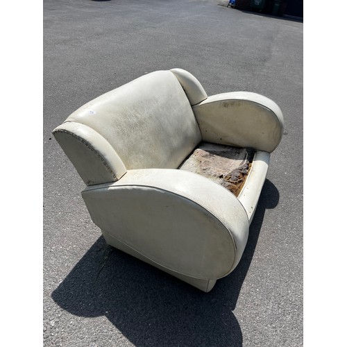 519 - Original art deco three seater sofa and two chairs, in leatherette upholstery, seat requiring recove... 