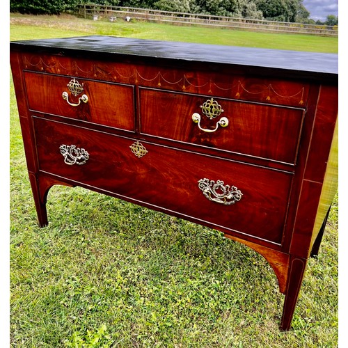 700 - A 19th century continental (possible Italian origin), flamed mahogany and inlaid three drawer commod... 