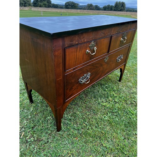 700 - A 19th century continental (possible Italian origin), flamed mahogany and inlaid three drawer commod... 